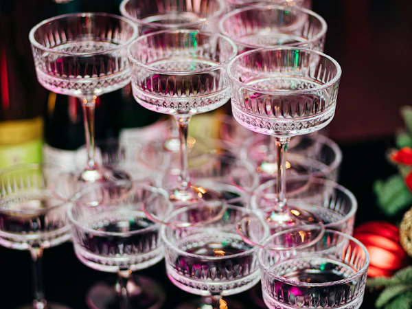 Champagne coupes stacked in a tower